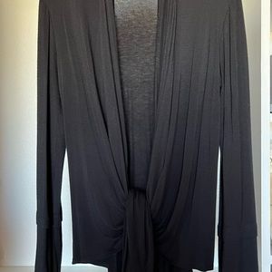 Long black cardigan, size medium. 95% rayon and 5% spandex.